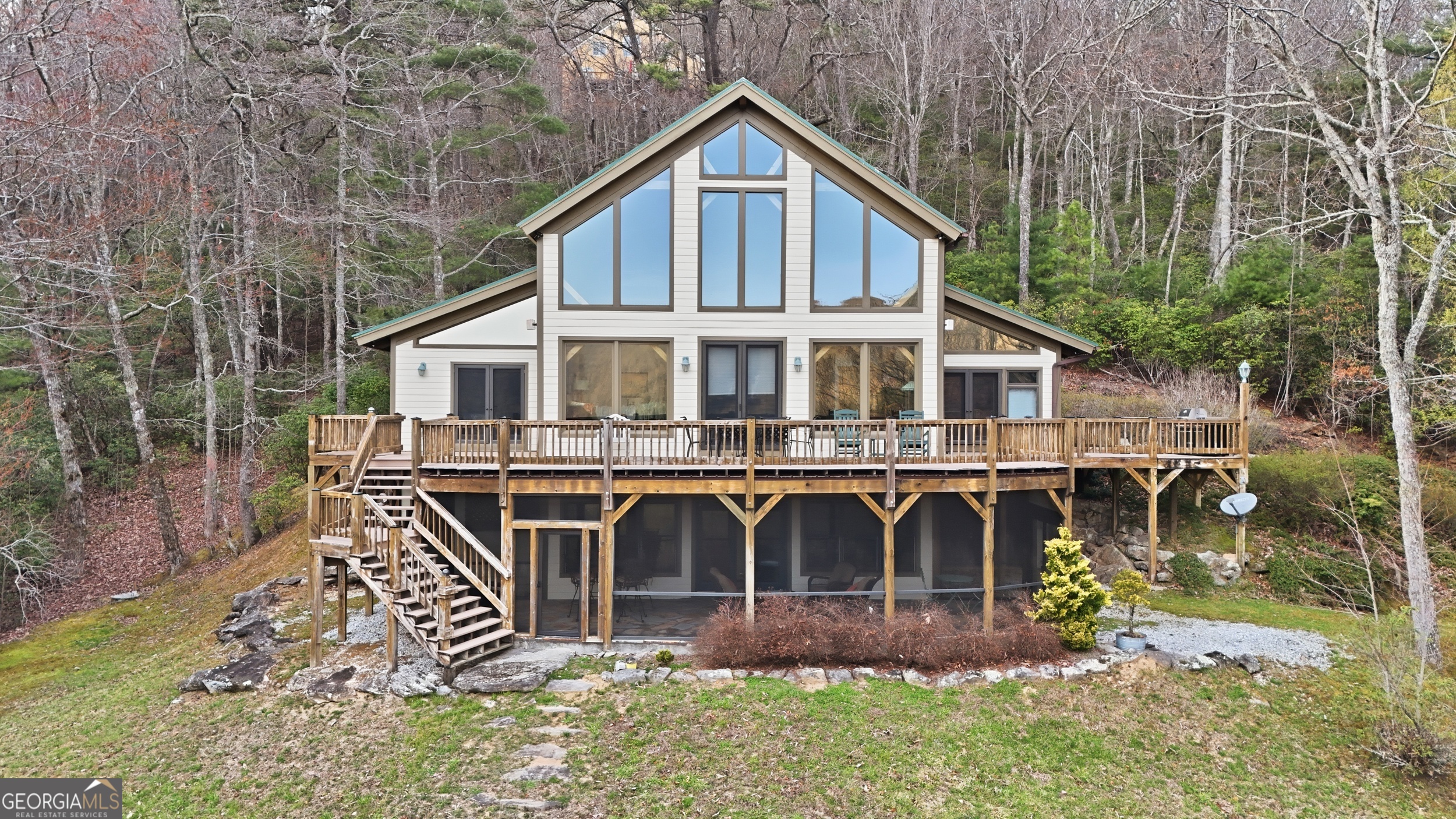 526 Grandaddy Still Road Scaly Mountain, NC 28775 - Photo 56 of 65 a front view of a house with garden