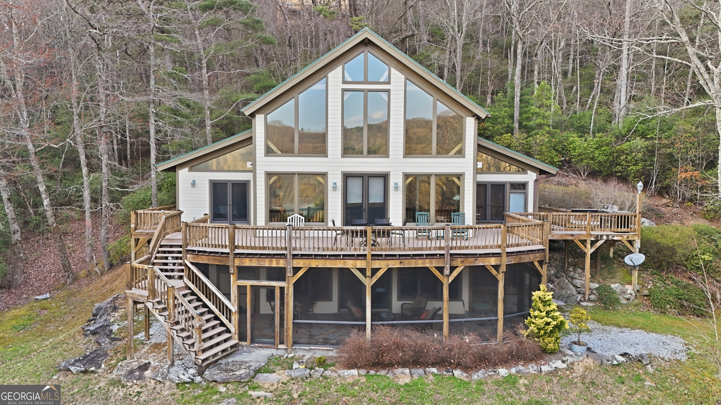 526 Grandaddy Still Road Scaly Mountain, NC 28775 - Photo 58 of 65 a view of a house with yard and sitting area
