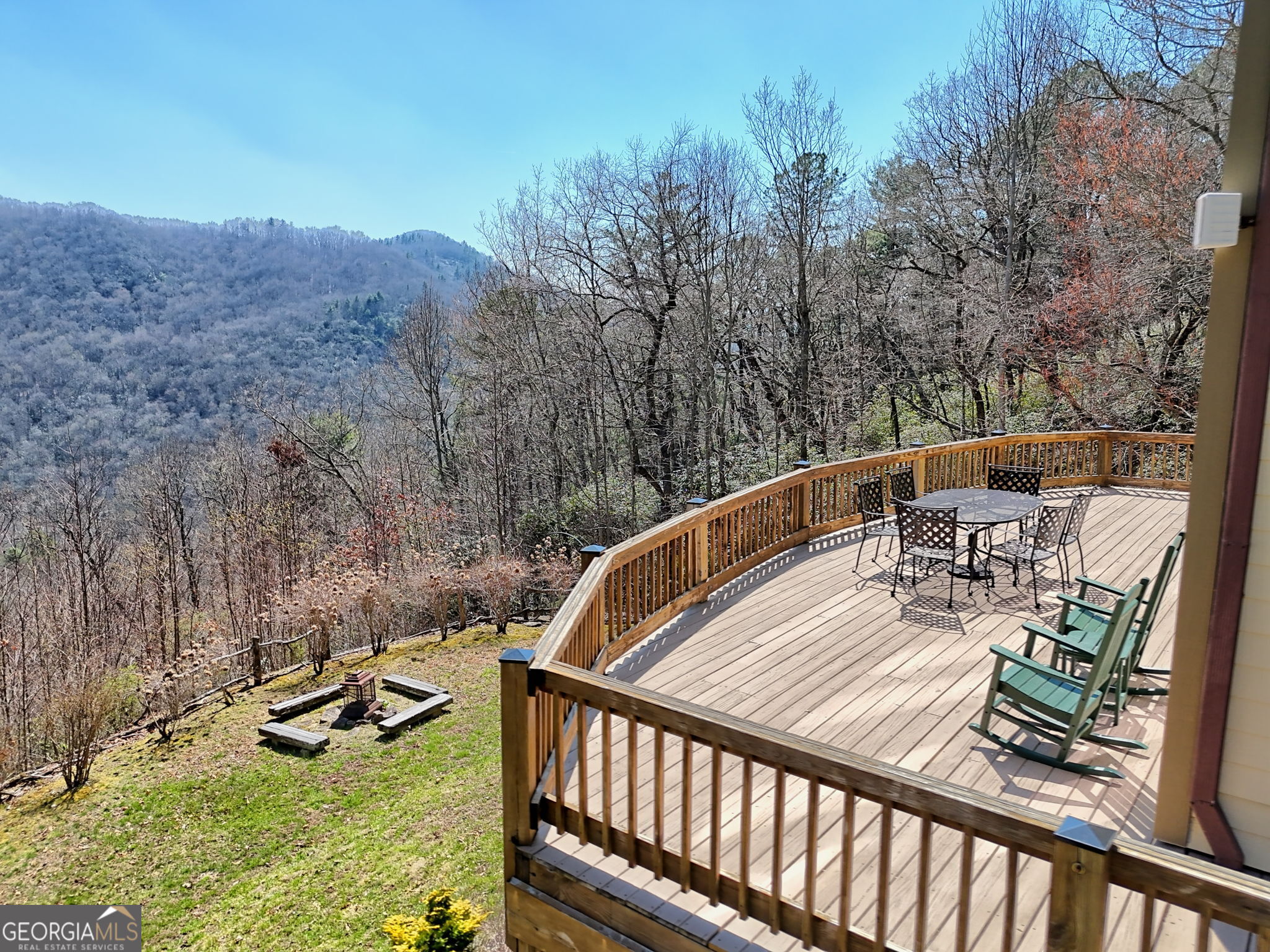 526 Grandaddy Still Road Scaly Mountain, NC 28775 - Photo 65 of 65 a view of a balcony with mountain view and wooden floor