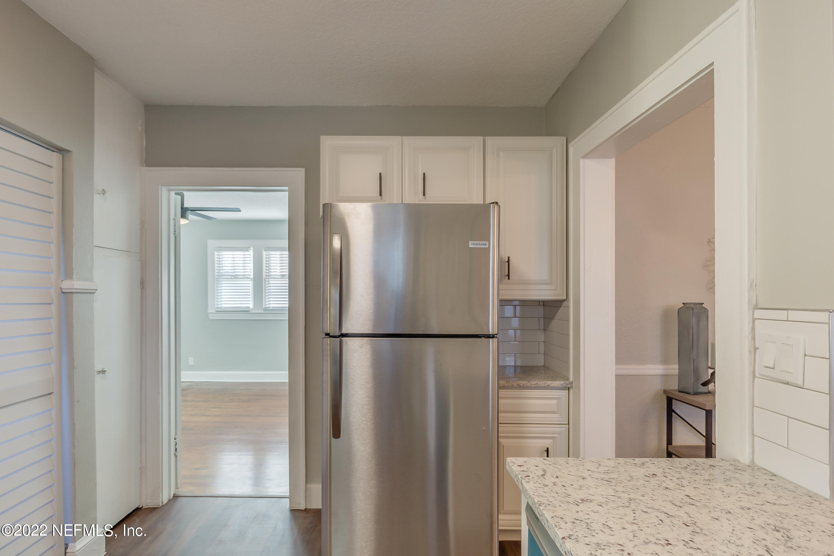 4012 Myra Street Jacksonville, FL 32205 - Photo 24 of 38 a white refrigerator freezer and a wooden floor