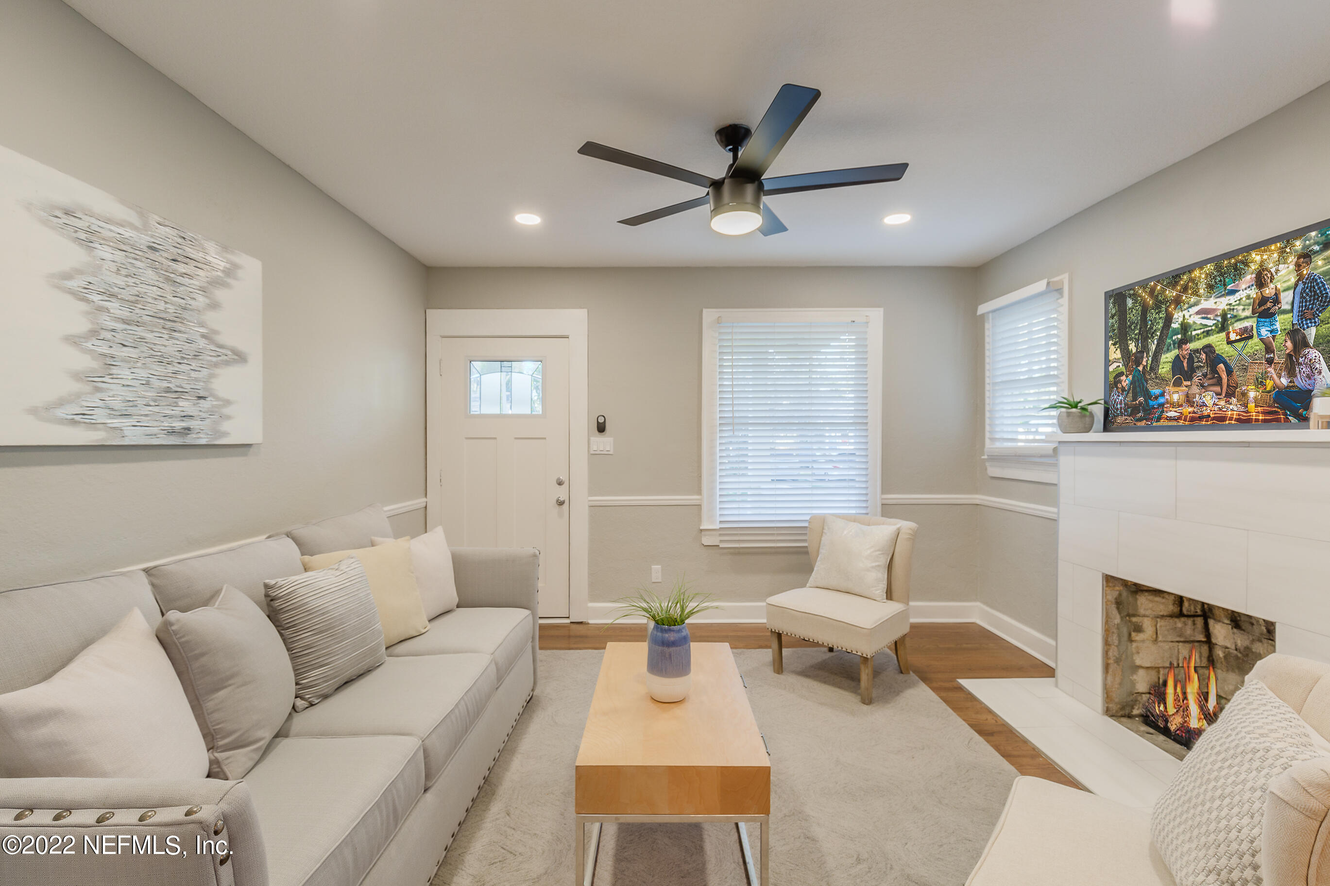 4012 Myra Street Jacksonville, FL 32205 - Photo 3 of 38 a living room with furniture and a fireplace