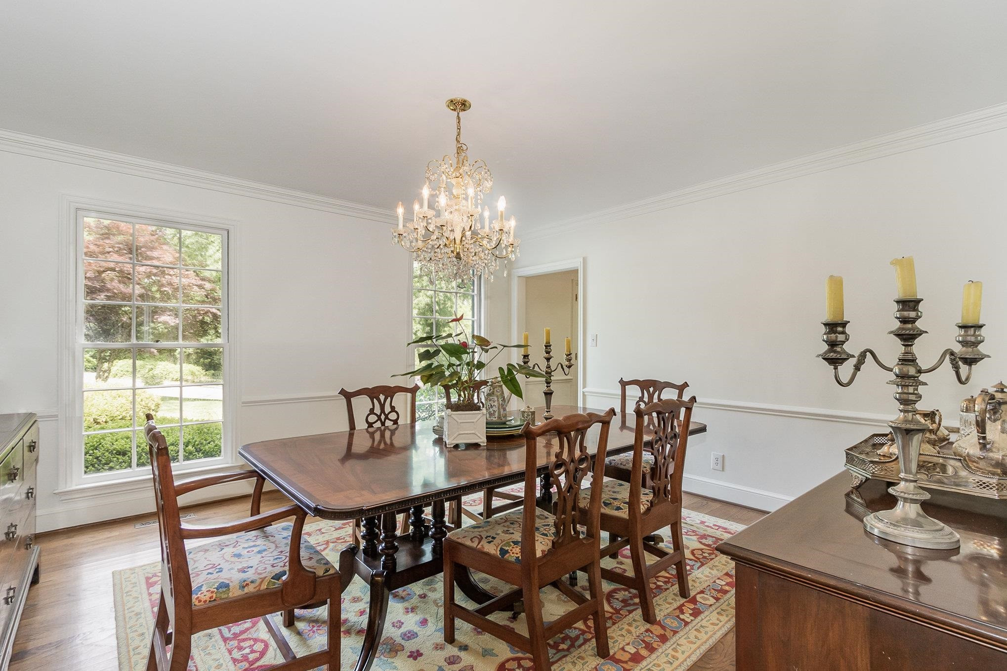 3327 Landor Road Raleigh, NC 27609 - Photo 24 of 60 a view of a dining room with furniture window and outside view
