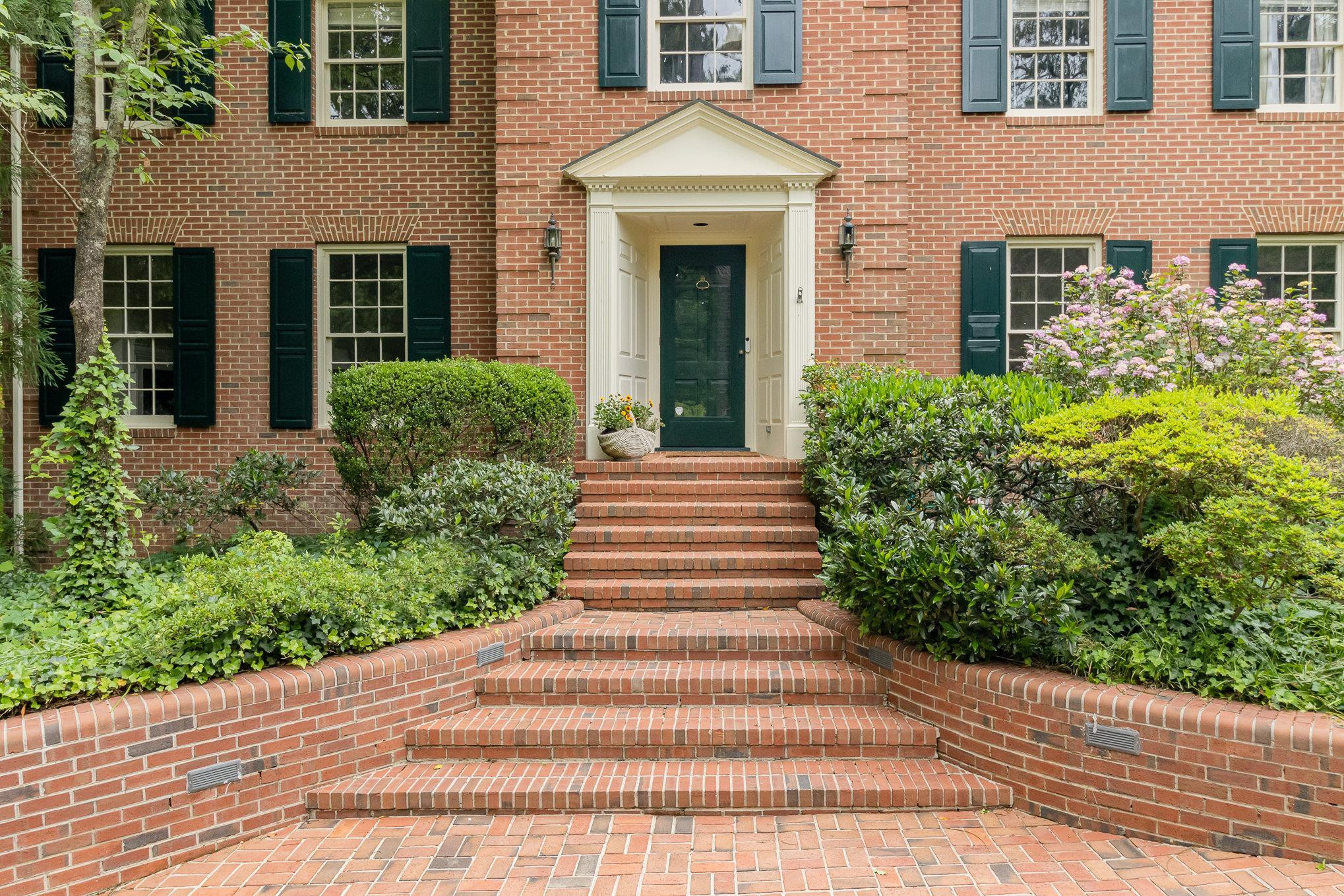 3327 Landor Road Raleigh, NC 27609 - Photo 3 of 60 a front view of a house with plants