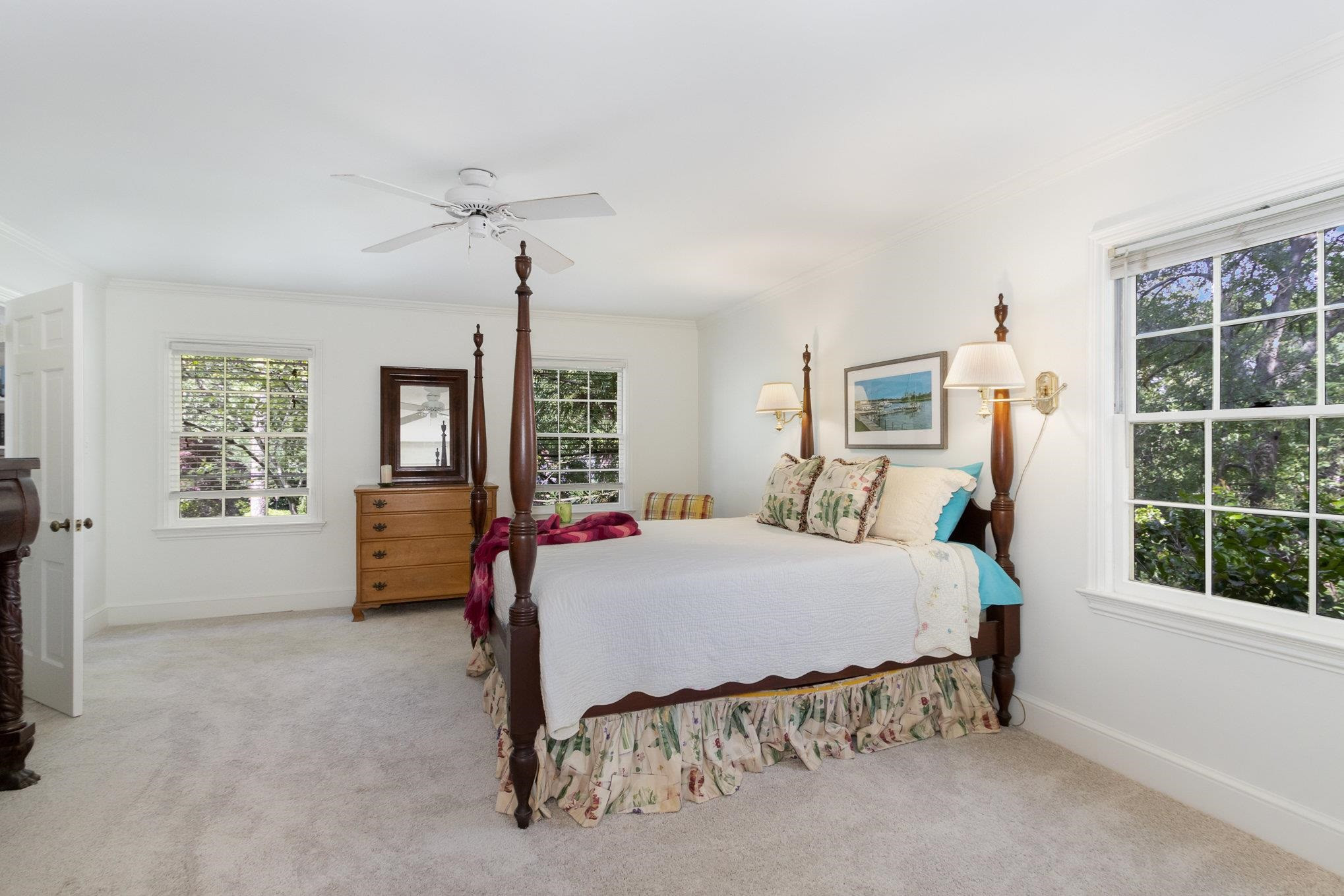 3327 Landor Road Raleigh, NC 27609 - Photo 41 of 60 a bedroom with a large bed and a window