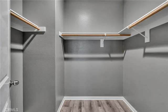 a view of an empty walk in closet