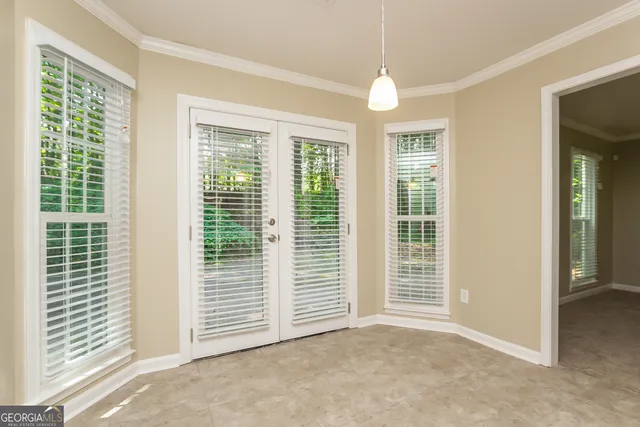 a view of a room with windows