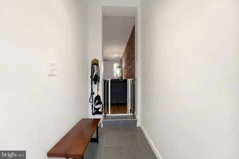 a view of hallway with stairs