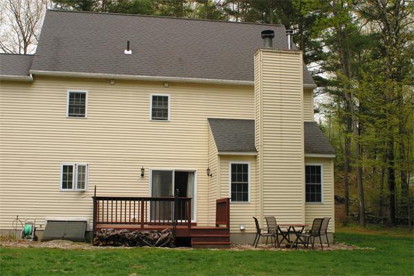 151 Butterworth Road Barre, MA 01005 - Photo 6 of 30 a view of a house with a yard