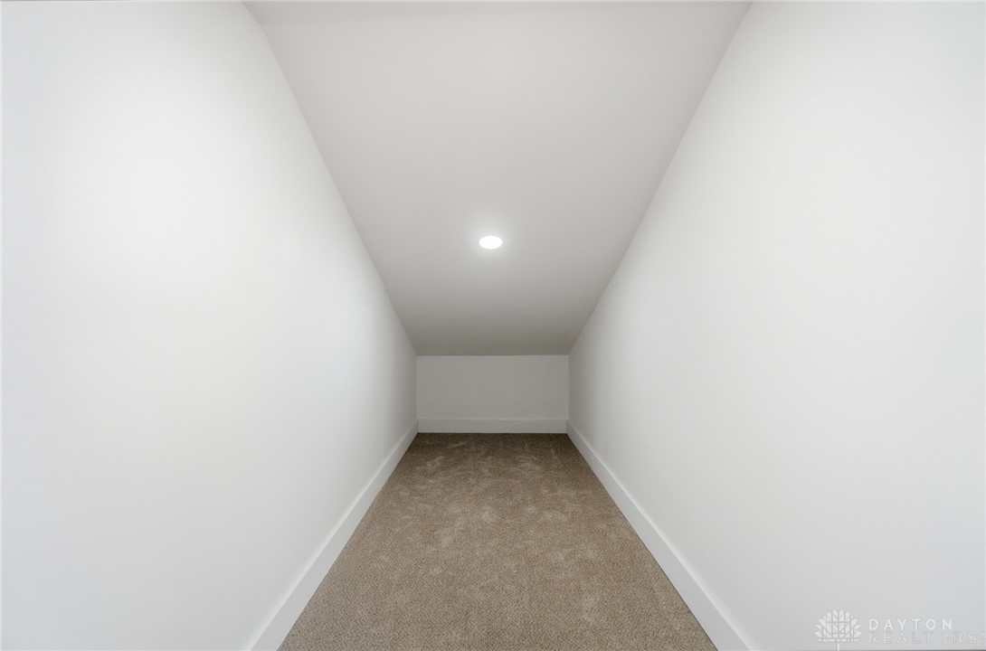 25 Englewood Road Springfield, OH 45504 - Photo 37 of 66 This spacious closet offers ample storage with clean lines and recessed lighting.