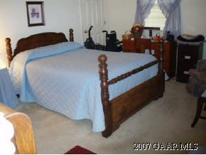 6415 Spring Hill Road Ruckersville, VA 22968 - Photo 7 of 12 a bedroom with a bed and a closet