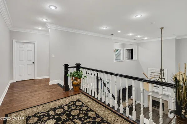 a very nice looking room with wooden floor