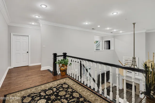 a very nice looking room with wooden floor