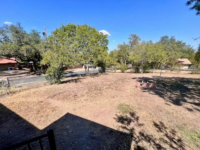 a view of backyard of the house