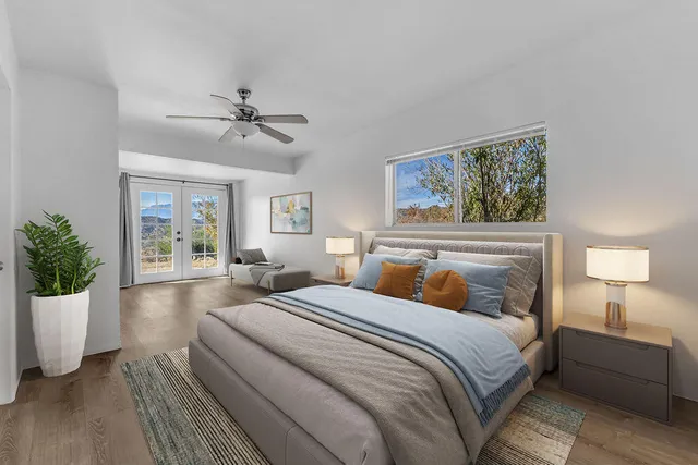 a bathroom with a sink toilet a mirror and shower