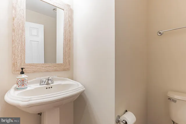 a bathroom with a sink and a toilet