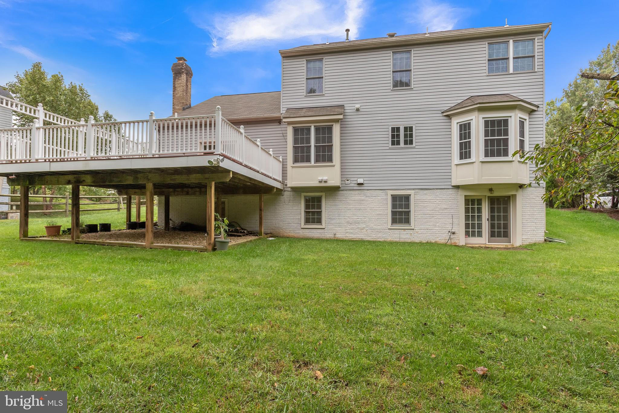 13907 Willow Tree Drive Rockville, MD 20850 - Photo 30 of 30 a view of a house with a backyard