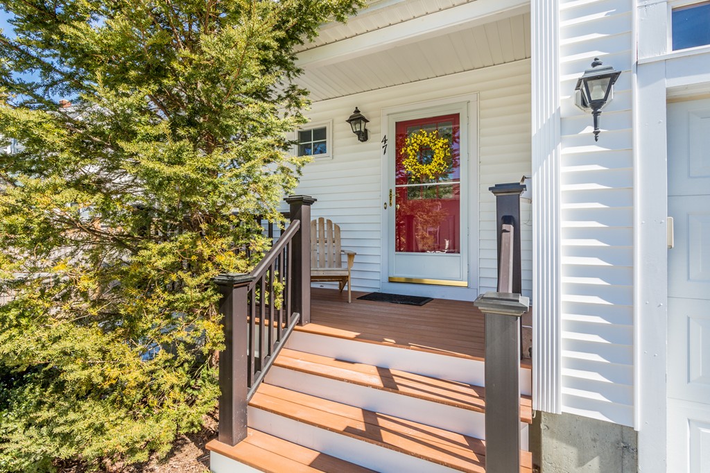a view of a house with a small yard