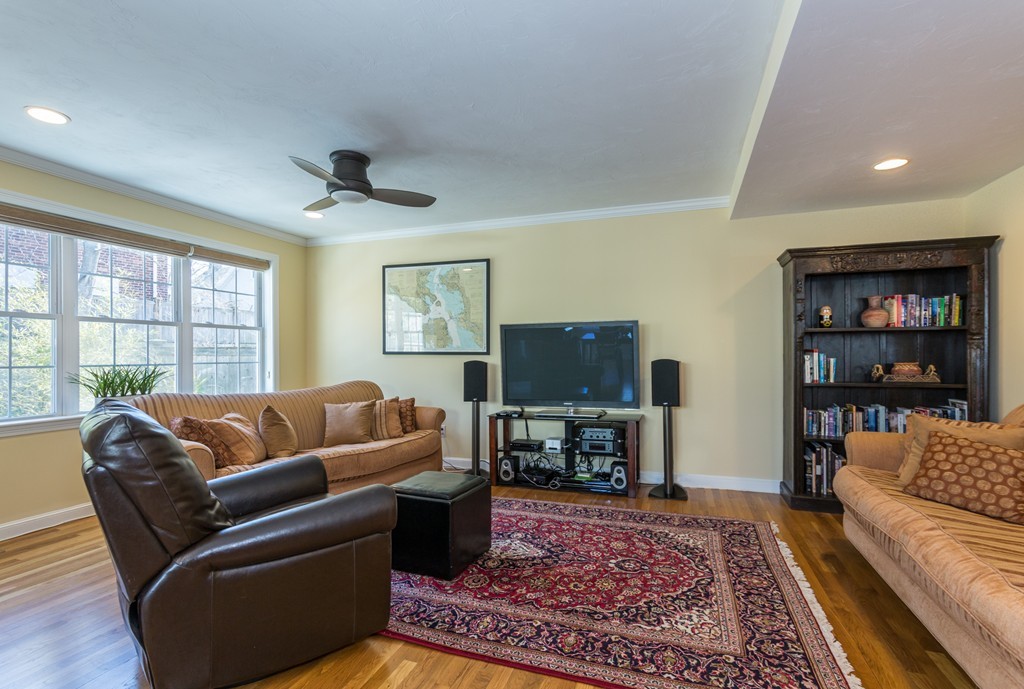 47 Crescent Road, Unit 47 Needham, MA 02494 - Photo 5 of 17 a living room with furniture and a flat screen tv