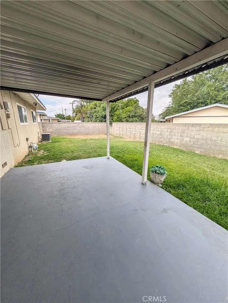 8641 Garfield Street, Unit 1 Riverside, CA 92504 - Photo 15 of 19 a view of a house with backyard and porch