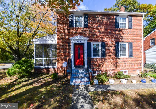 front view of a house with a small yard