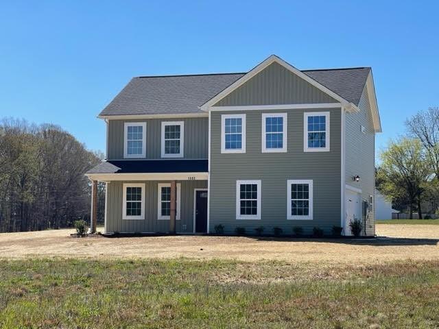 1502 Jack Davis Road Monroe, NC 28112 - Photo 1 of 18 a front view of a house with a yard