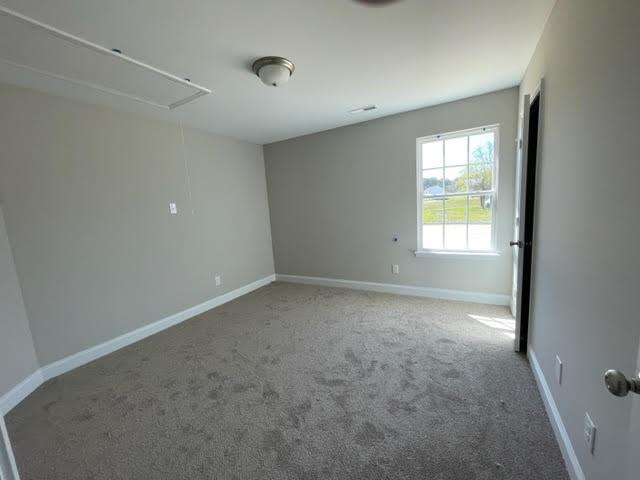 1502 Jack Davis Road Monroe, NC 28112 - Photo 13 of 18 a view of an empty room with a window