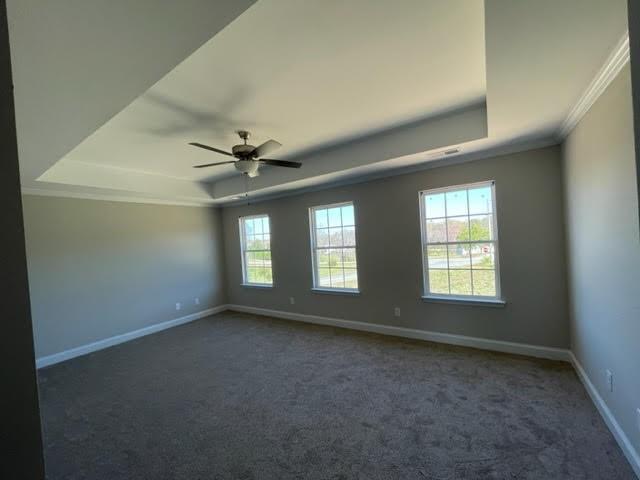 1502 Jack Davis Road Monroe, NC 28112 - Photo 14 of 18 an empty room with a ceiling fan and window