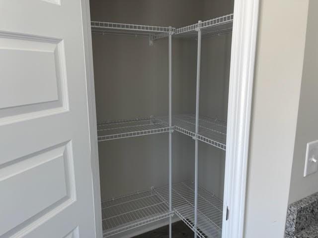 1502 Jack Davis Road Monroe, NC 28112 - Photo 16 of 18 a bathroom with a glass shower door