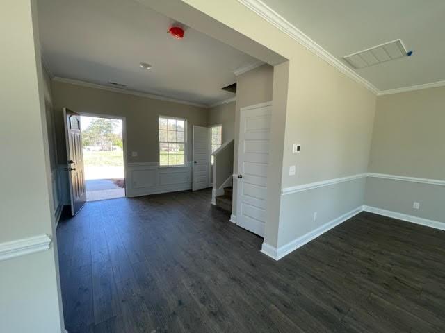 1502 Jack Davis Road Monroe, NC 28112 - Photo 2 of 18 a view of a hallway with wooden floor and stairs