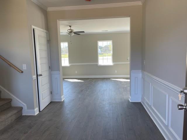 1502 Jack Davis Road Monroe, NC 28112 - Photo 3 of 18 an empty room with wooden floor and a fireplace