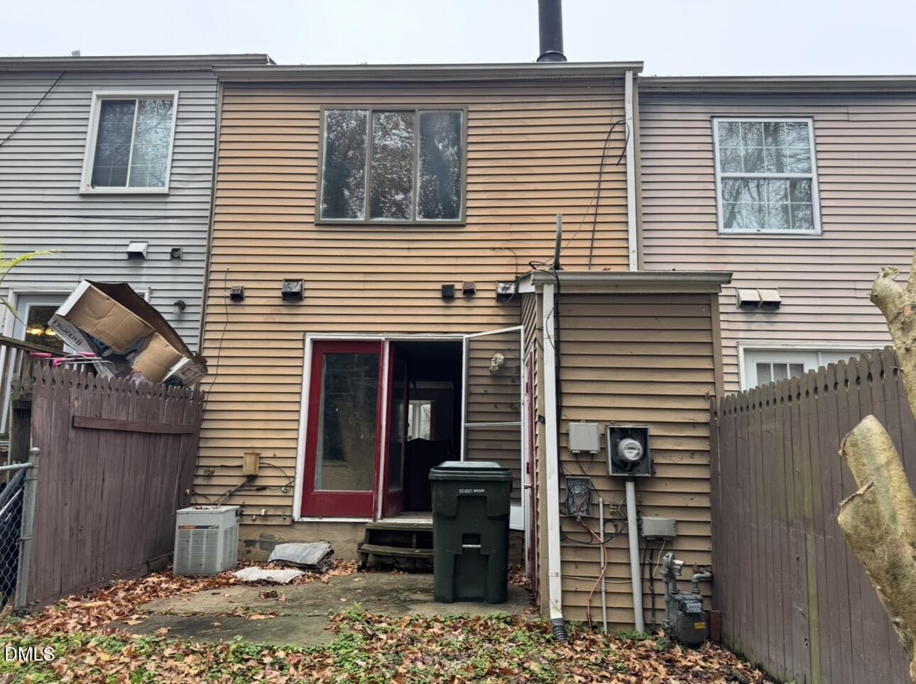 8147 McGuire Drive Raleigh, NC 27616 - Photo 19 of 19 a view of a house with a door and chair