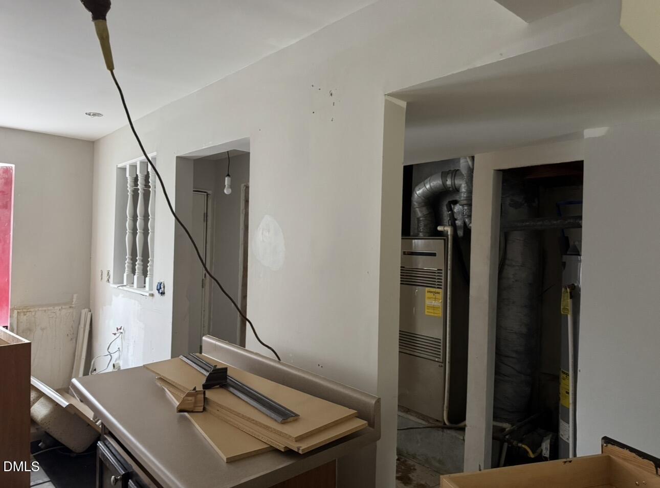 8147 McGuire Drive Raleigh, NC 27616 - Photo 4 of 19 a view of workspace with wooden floor