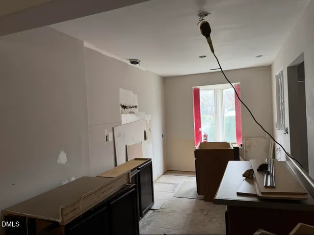 a view of workspace with wooden floor