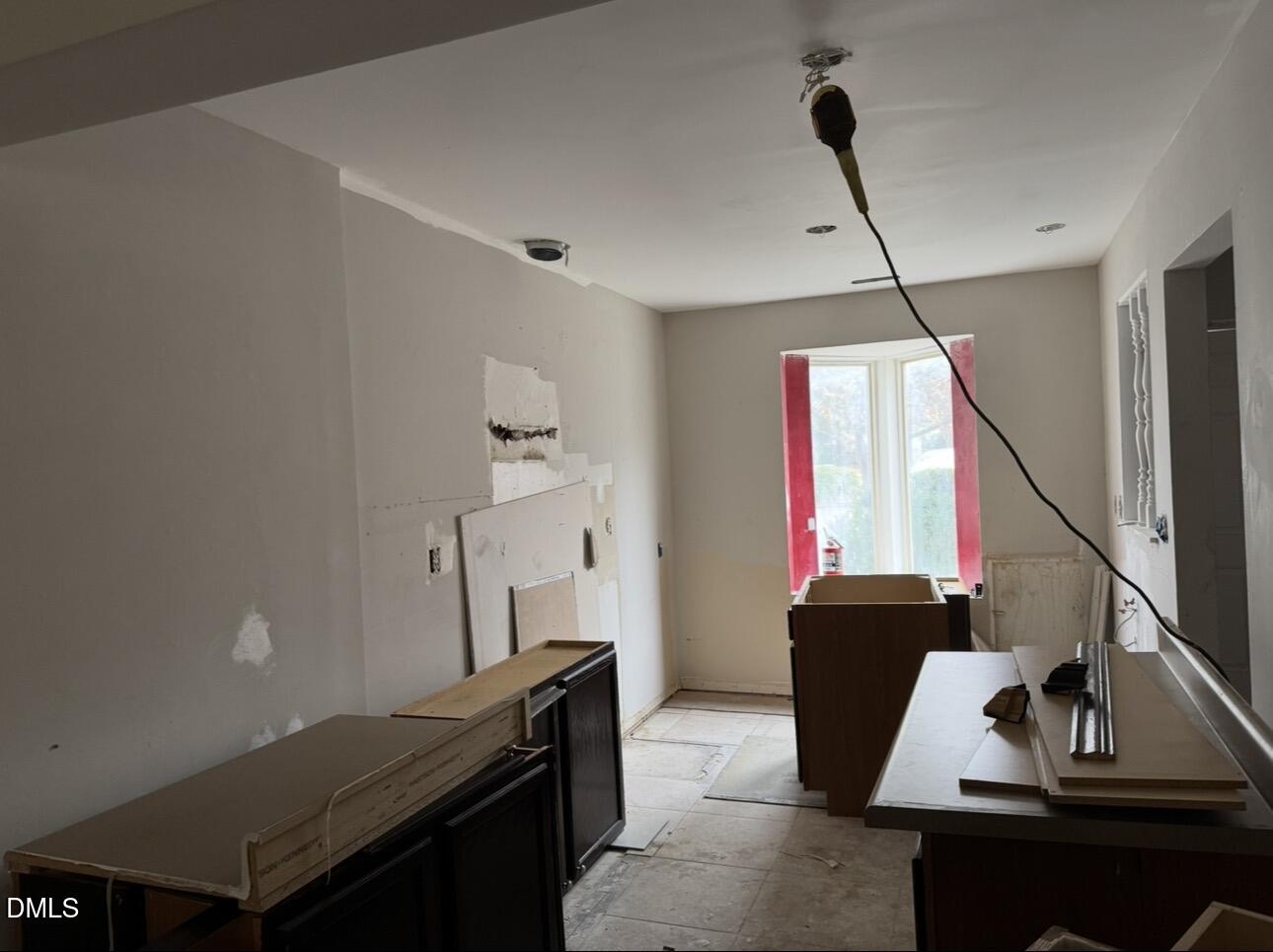 8147 McGuire Drive Raleigh, NC 27616 - Photo 5 of 19 a view of workspace with wooden floor