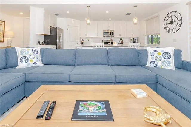 a kitchen with a sink cabinets and appliances