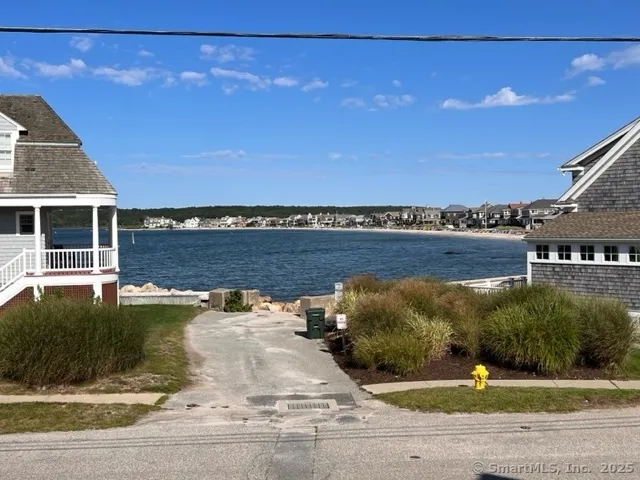 a view of a swimming pool with an ocean view