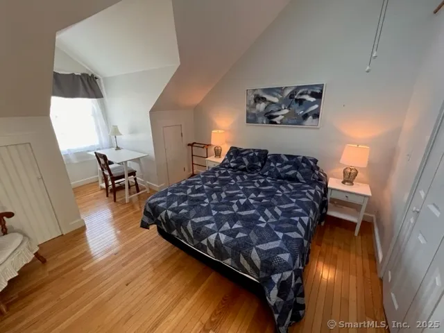 a bed room with a bed and a couch