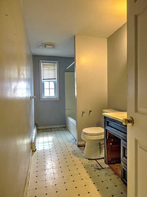 24 Estes Road Hanover, MA 02339 - Photo 18 of 27 a bathroom with a sink toilet and shower