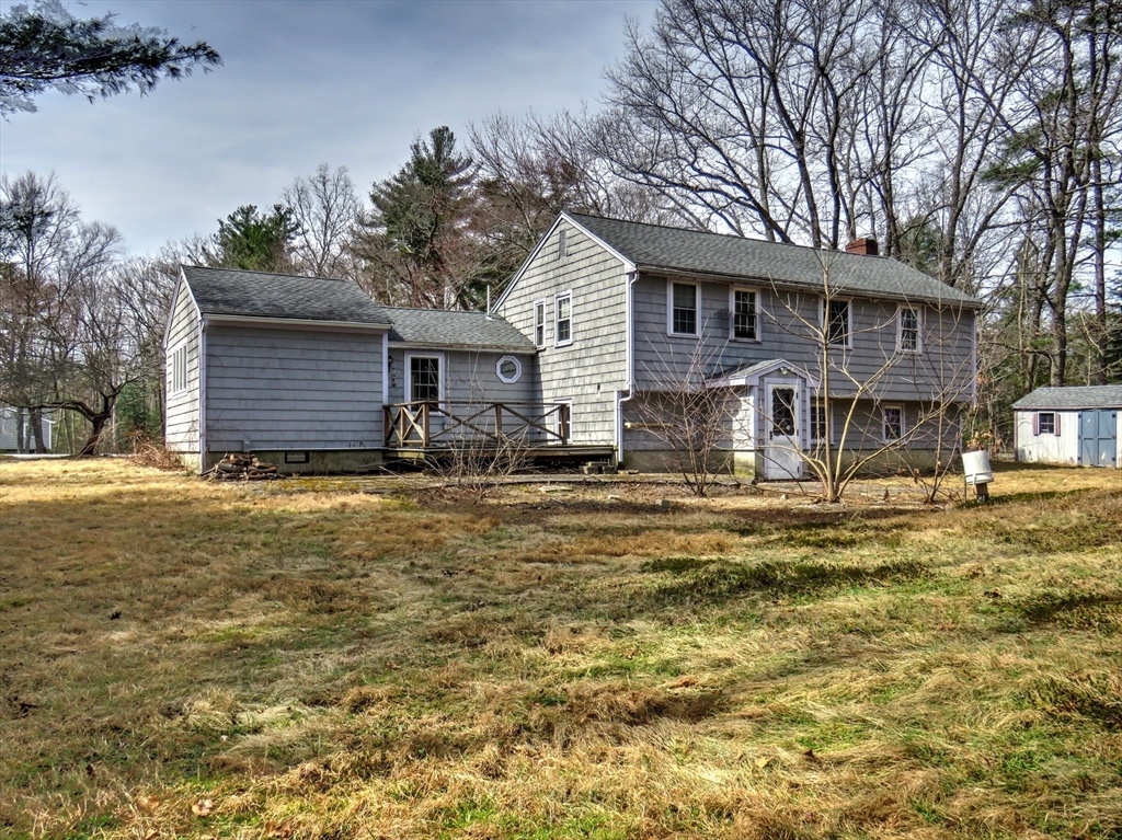 24 Estes Road Hanover, MA 02339 - Photo 3 of 27 a front view of a house with a patio