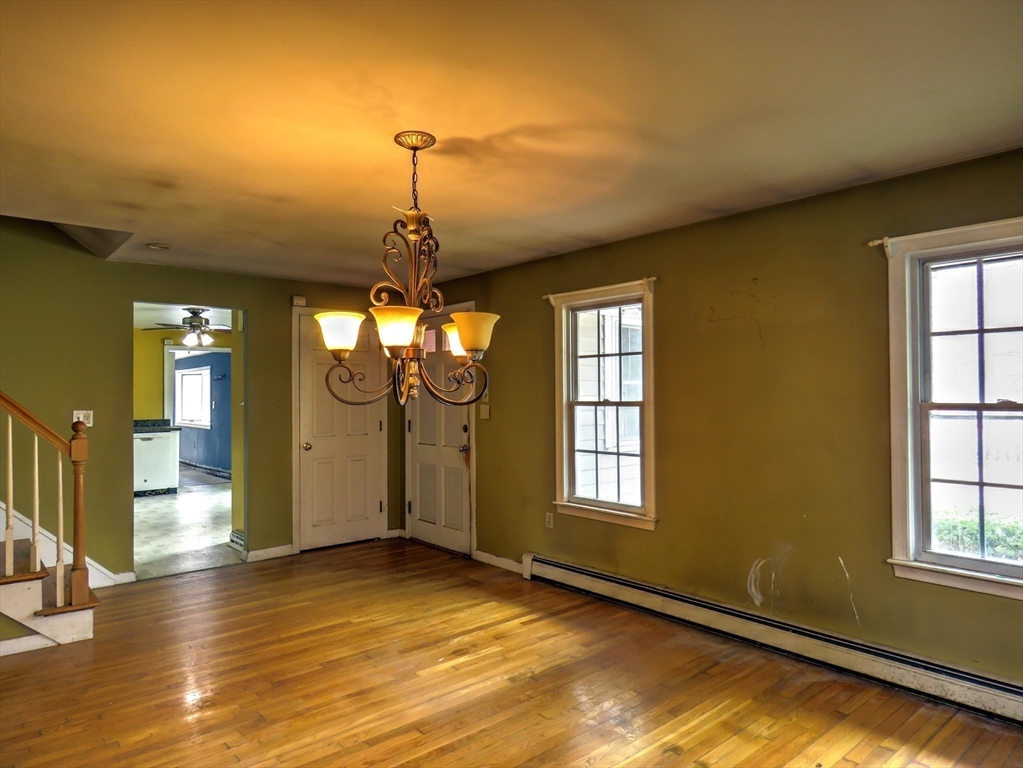 24 Estes Road Hanover, MA 02339 - Photo 5 of 27 a view of a livingroom with a window