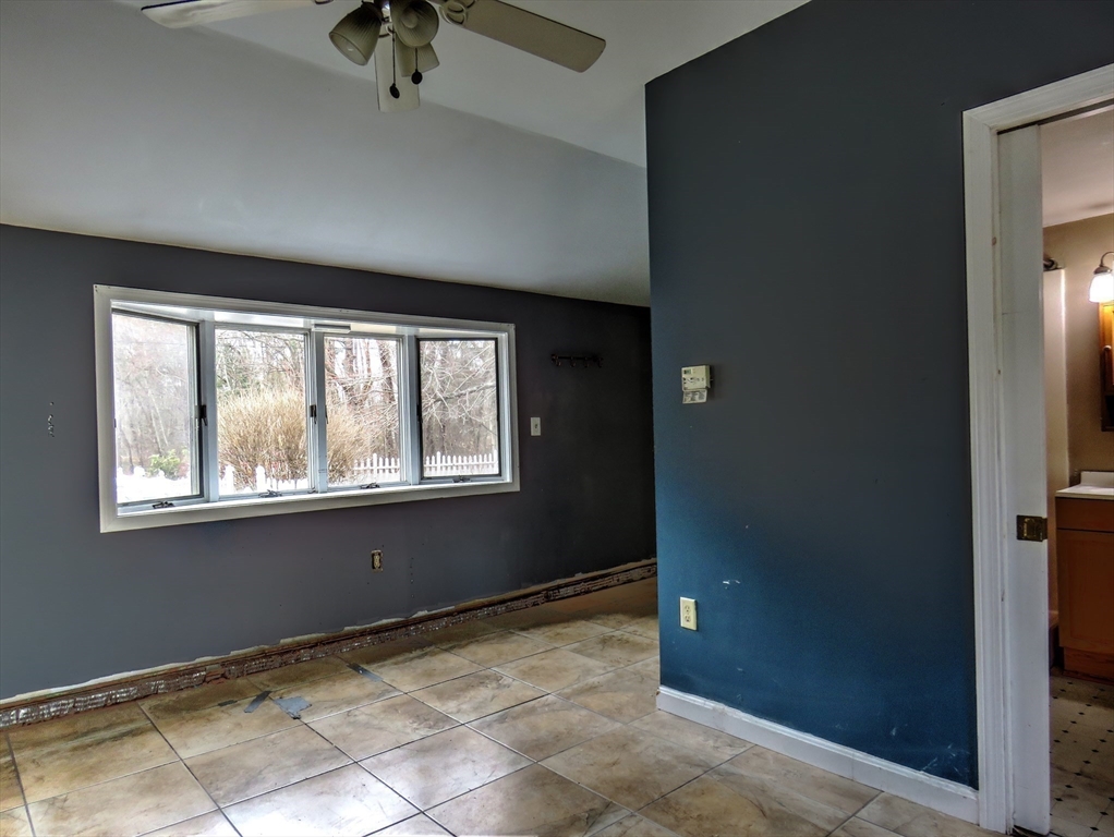 24 Estes Road Hanover, MA 02339 - Photo 10 of 27 a view of an empty room and window