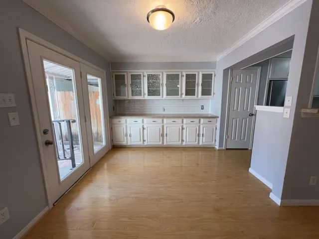 an empty room with windows