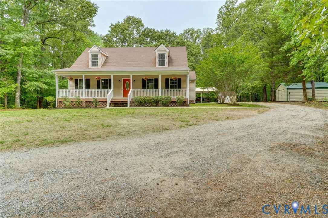 3820 Mt Pleasant Road Providence Forge, VA 23140 - Photo 31 of 40 a front view of a house with a garden