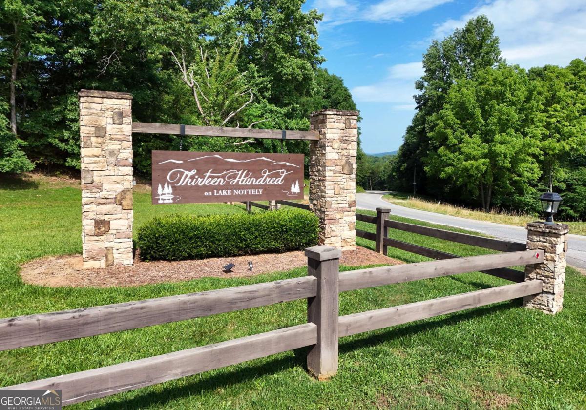 a view of a park that has sign board