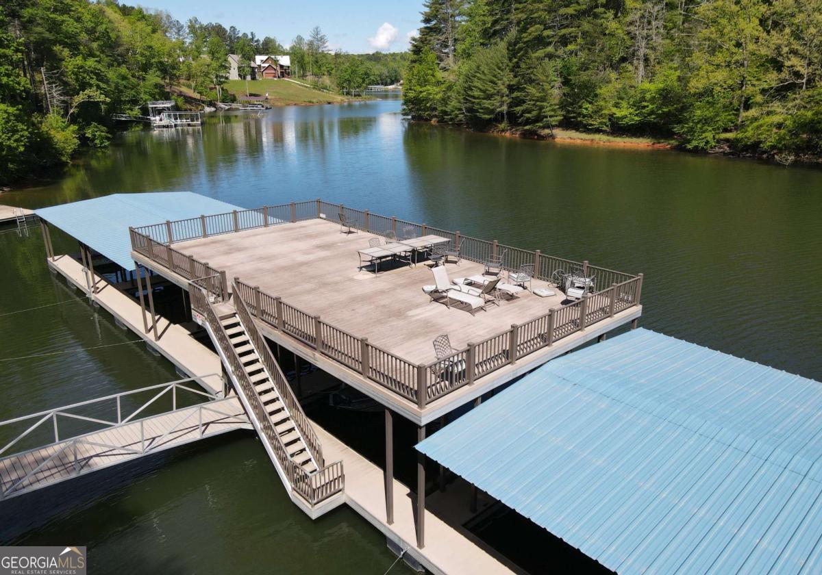 Lot 59 Ridge Peak View Blairsville, GA 30512 - Photo 17 of 49 a view of a balcony with chairs