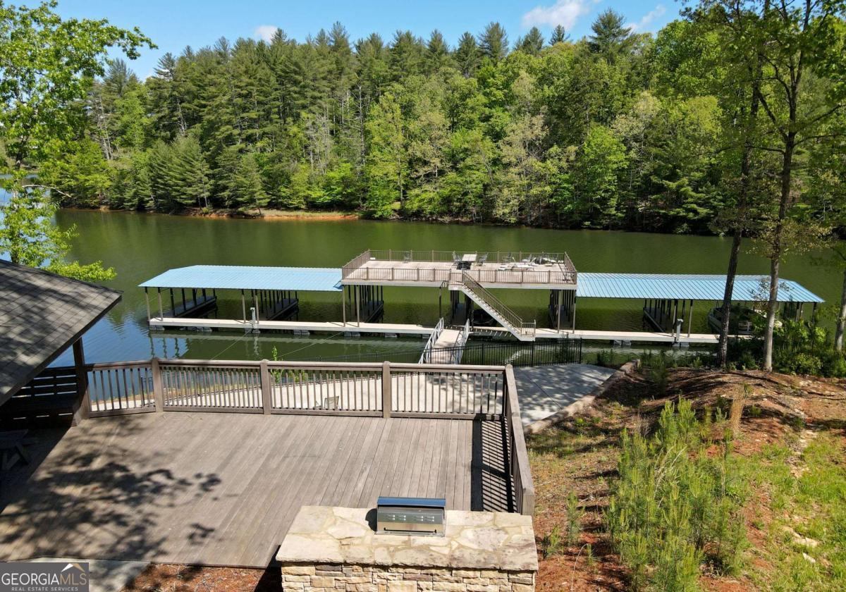 Lot 59 Ridge Peak View Blairsville, GA 30512 - Photo 18 of 49 a view of a swimming pool with a lake view