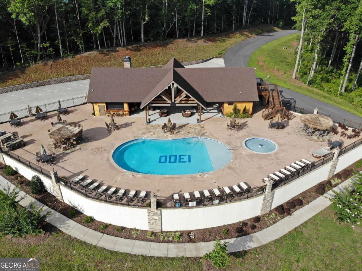 Lot 59 Ridge Peak View Blairsville, GA 30512 - Photo 6 of 49 a view of a swimming pool with a yard
