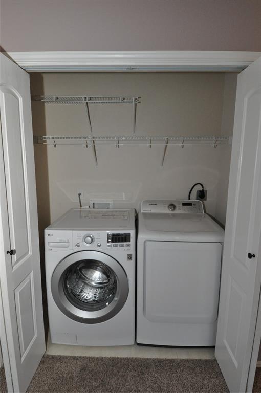1900 Scofield Ridge Parkway, Unit 5403 Austin, TX 78727 - Photo 12 of 26 a utility room with dryer and washer