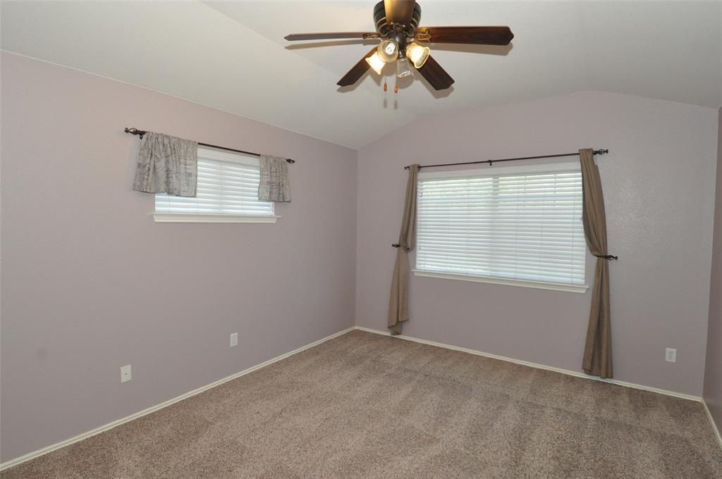 1900 Scofield Ridge Parkway, Unit 5403 Austin, TX 78727 - Photo 13 of 26 a view of a room with a ceiling fan and a window