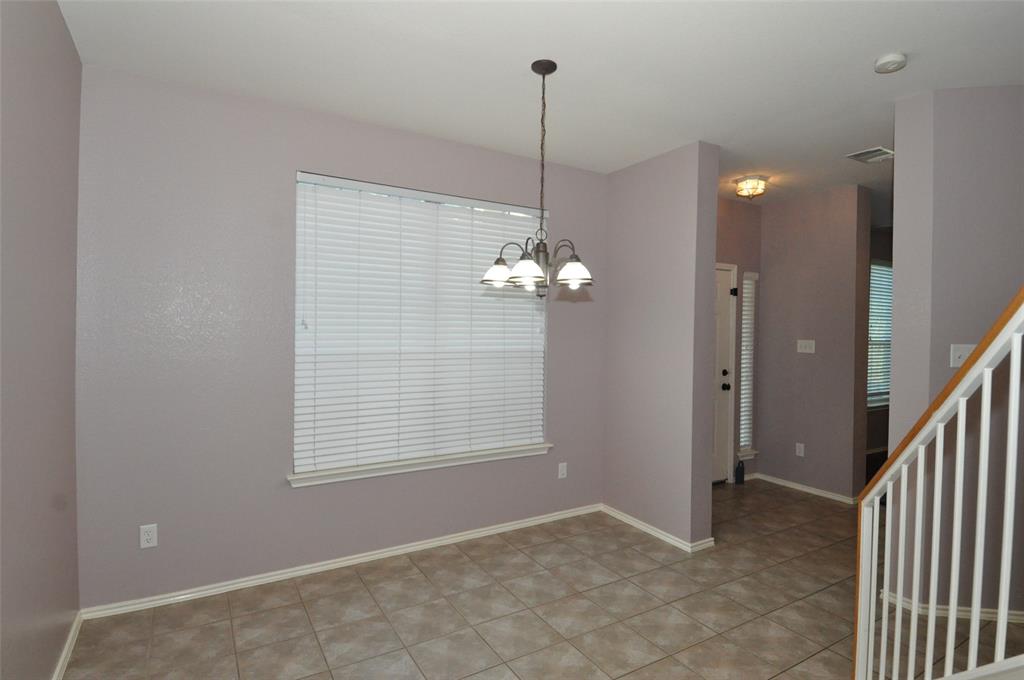 1900 Scofield Ridge Parkway, Unit 5403 Austin, TX 78727 - Photo 9 of 26 a view of a chandelier in big room and chandelier
